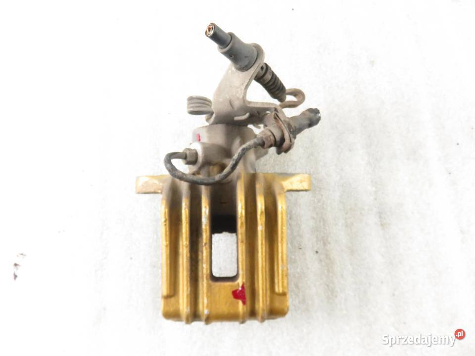 ZACISK LEWY TYŁ VW GOLF VI 16 TDI