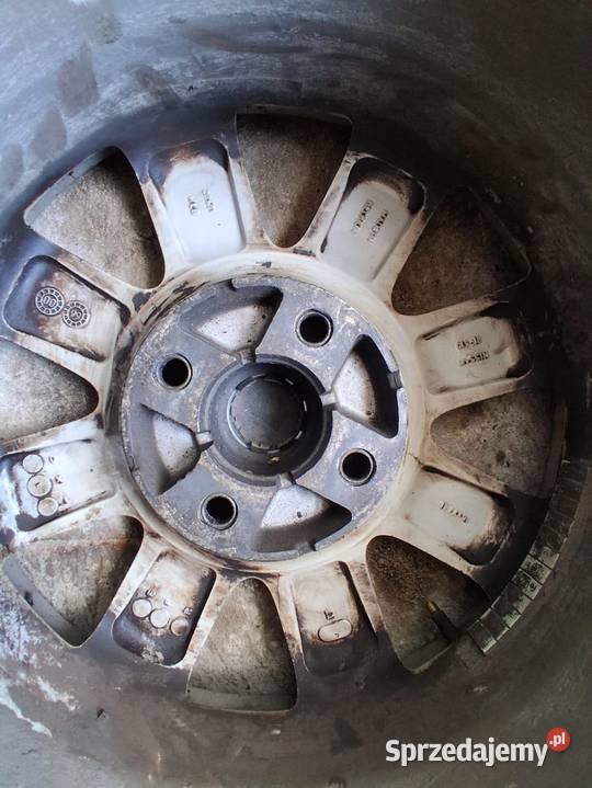 Felgi aluminiowe Nissan R16x7J ET40 z oponami Chocianów