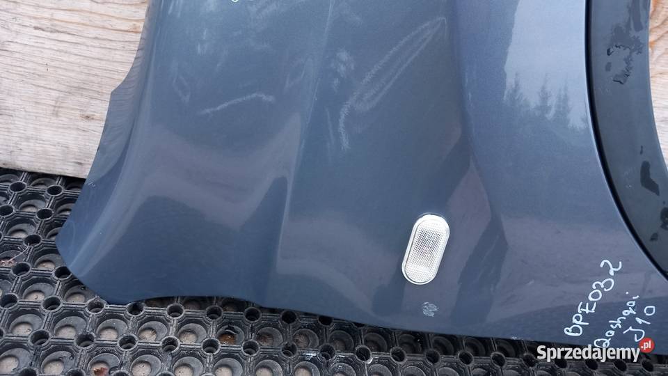NISSAN QASHQAI J10 BŁOTNIK PRZÓD PRAWY B526 osobowe Zbierkowo