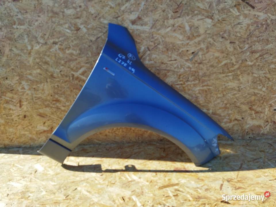 BŁOTNIK PRAWY PRZÓD AUDI Q7 4L LY7E ORYGINAŁ Przystajń