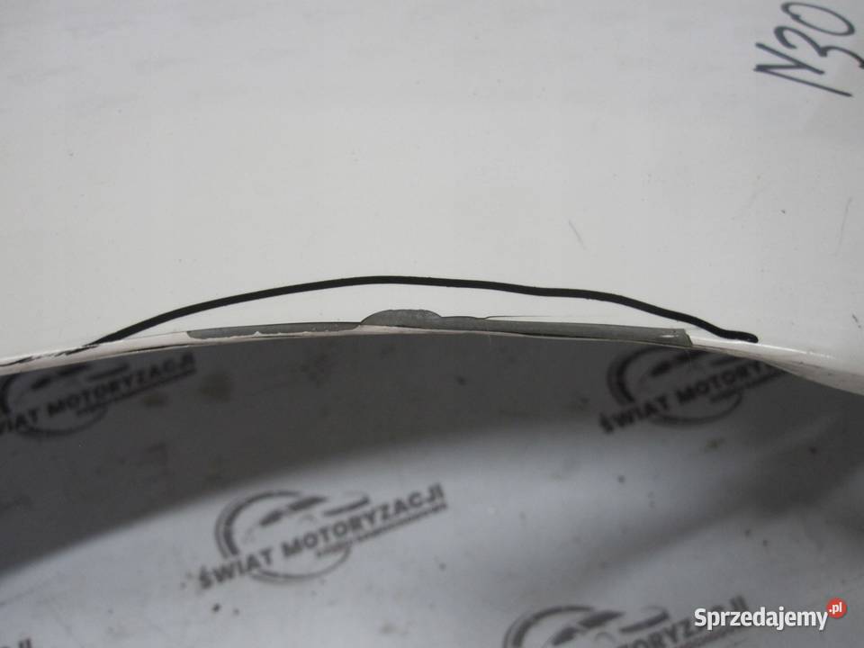 OPEL CORSA E 17r błotnik prawy przód