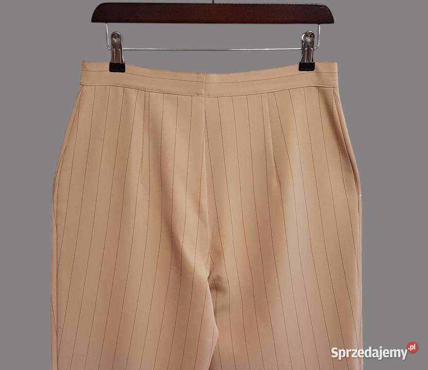 Damskie eleganckie beżowe spodnie materiałowe w Paski Chrzanów sprzedam