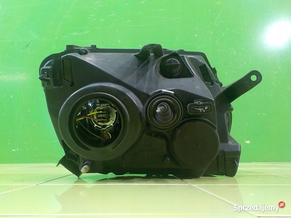 DACIA DUSTER I 09r 5D lampa lewa przod Motoryzacja mazowieckie