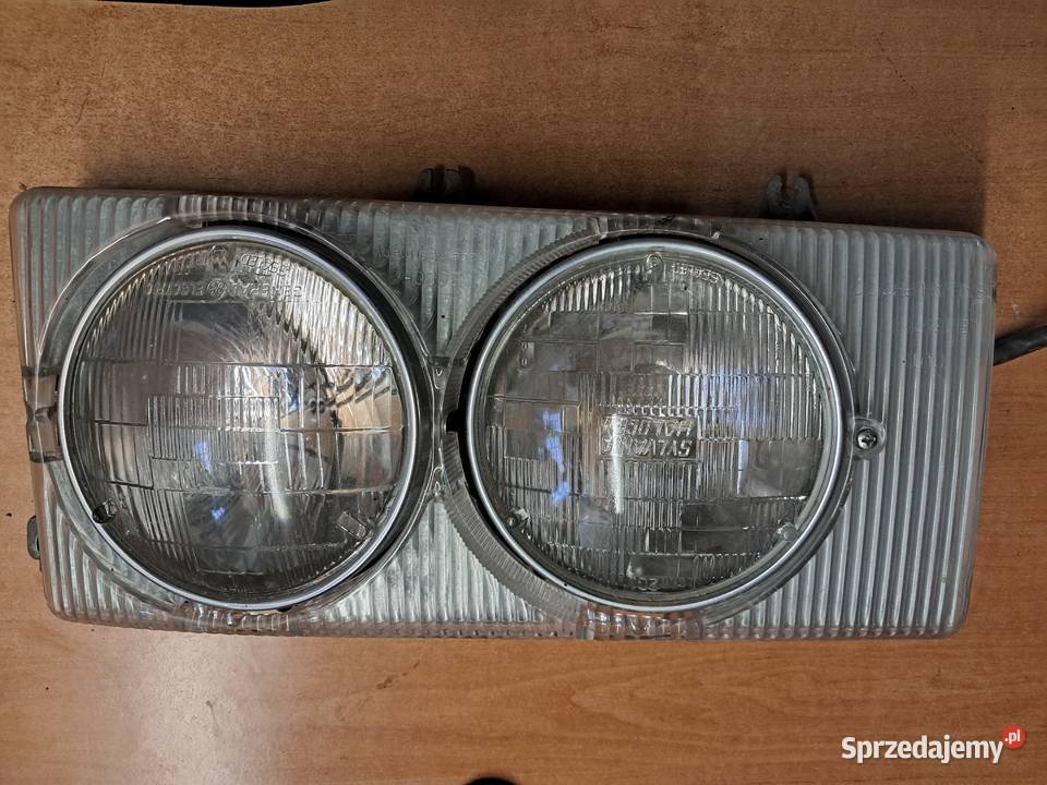 LAMPA PRZEDNIA LEWA MERCEDES W116 WERSJA USA osobowe Lampy przednie Cieszyn