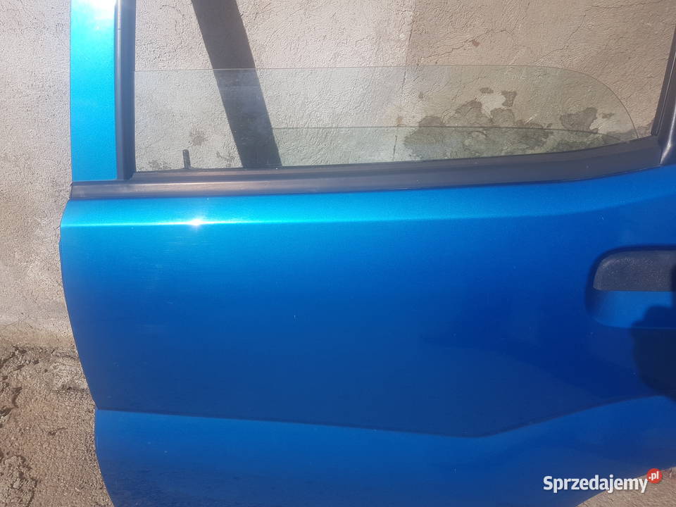 Suzuki Ignis MH SUBARU G3X JUSTY drzwi LEWY TYŁ