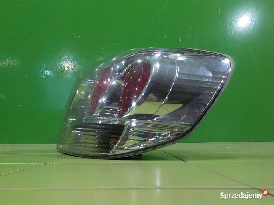 MITSUBISHI OUTLANDER I 24 MIVEC AUT 04r lampa osobowe Oświetlenie Suków