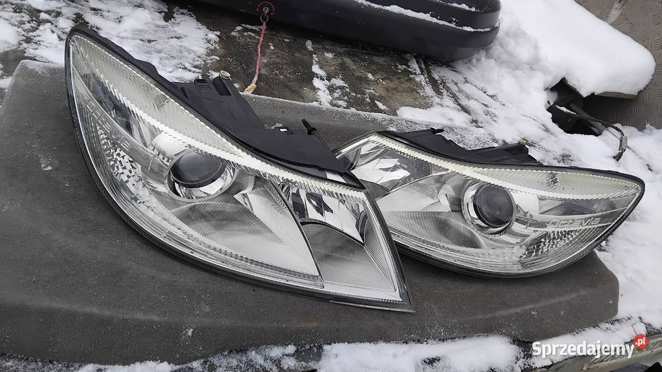 Skoda Octavia II LIFT reflektor ORG EU
