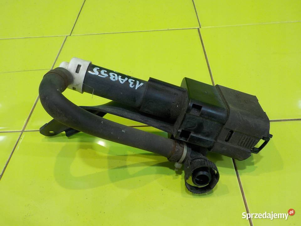 MAZDA CX7 23 T 08r spryskiwacz lampy lewy przod Suków