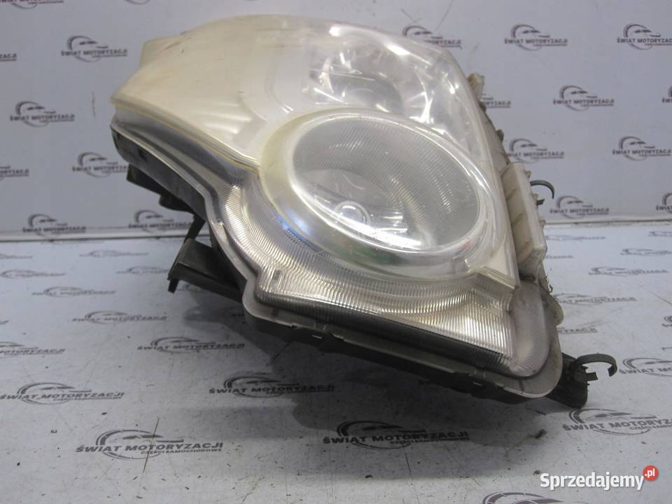 XTRAIL II T31 LIFT 10r lampa lewa przód HCR599