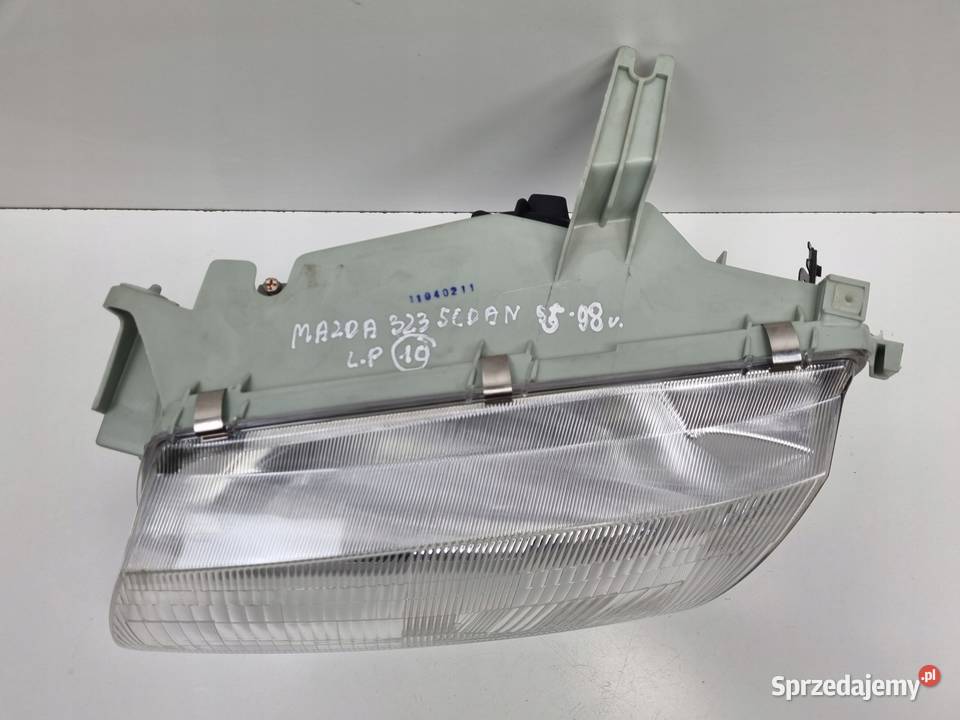 LAMPA LEWA Mazda 323 BA SEDAN 9598r PRZEDNIA Rudka