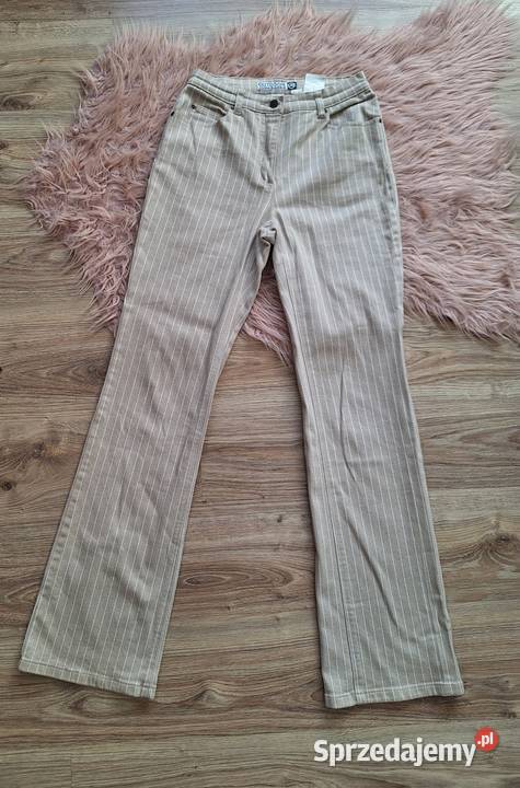 Piękne szerokie spodnie dzwony beżowe w prążki Rozmiar 38(M) Kraków