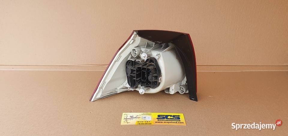 VOLKSWAGEN GOLF V LAMPA TYŁ PRAWA 1K6945096 Bieleń