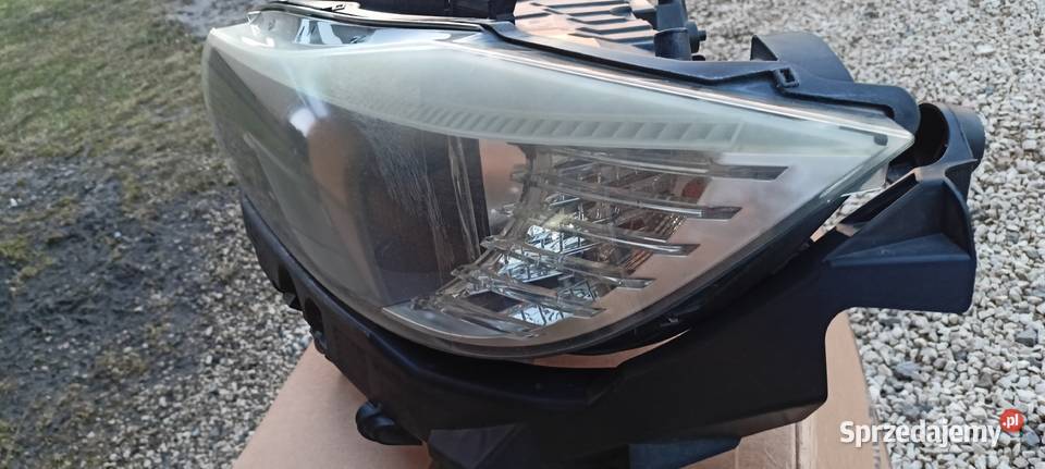 BMW e9091LCI lift 0811 EU reflektor lampa lewa Lampy przednie Radymno