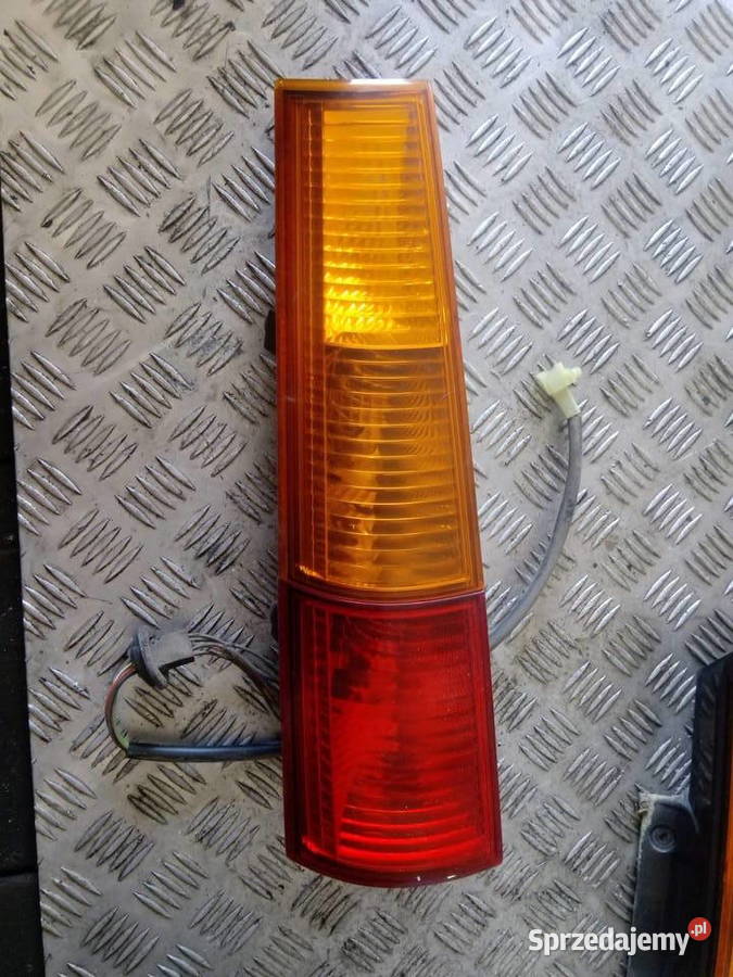 LAMPA TYŁ TYLNA LEWA SUZUKI IGNIS 2 II 0307 Radłów