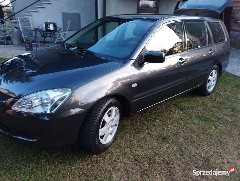 Lancer VII 20 136 stan idealny