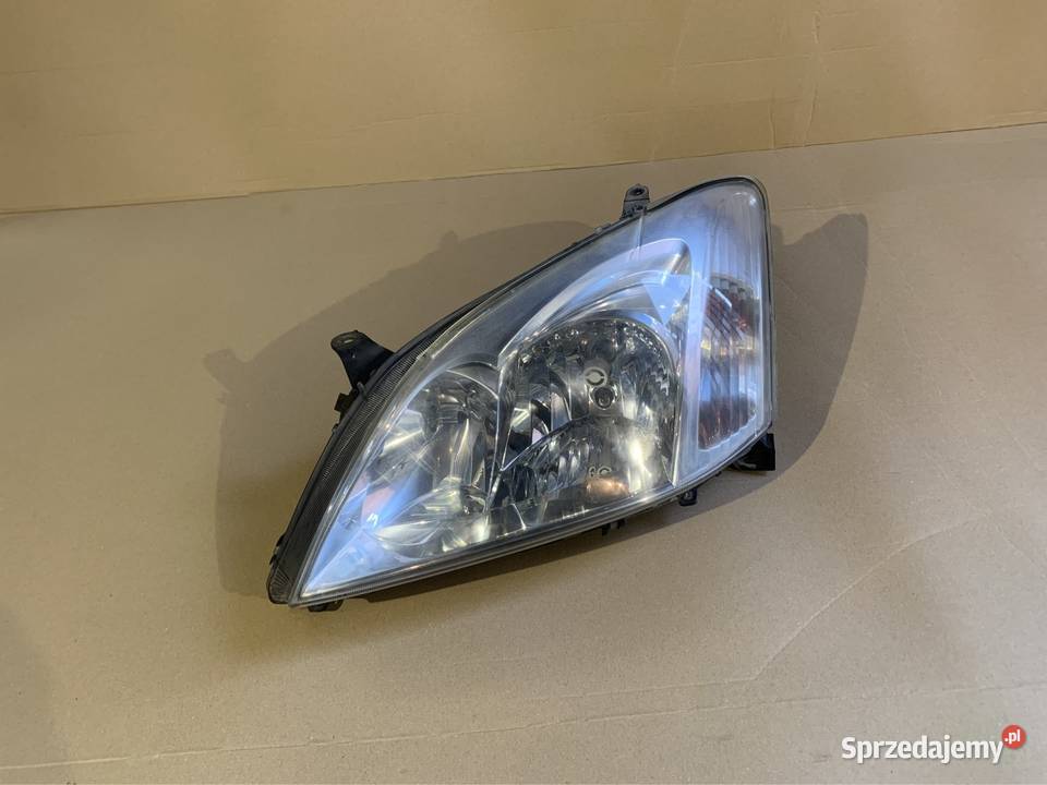 8611002100 reflektor lampa przód lewa toyota