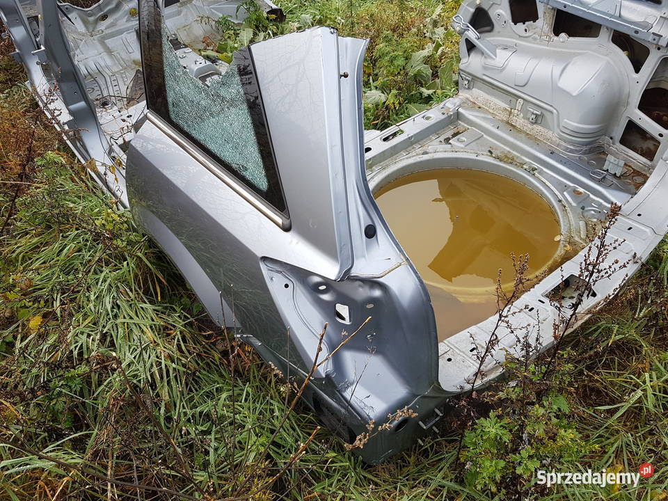 OPEL ASTRA H KOMBI BLOTNIK TYLNY LEWY CWIARTKA Turek