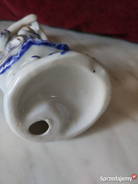 Figurka z porcelanydama z brawami Ropa