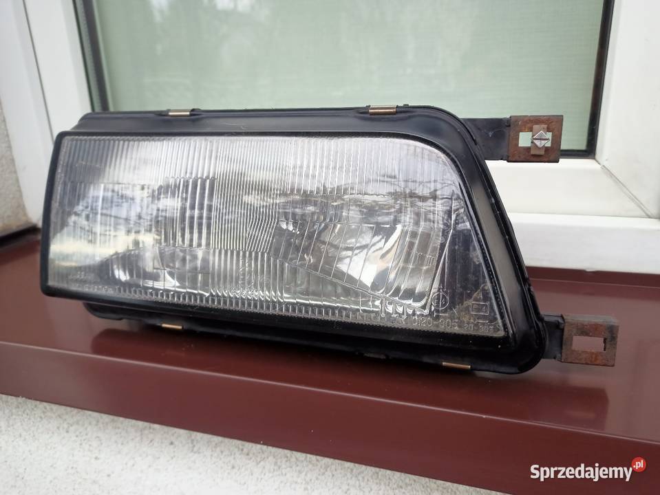 Nissan Sunny N13 lampa przednia prawa reflektor Sieradz