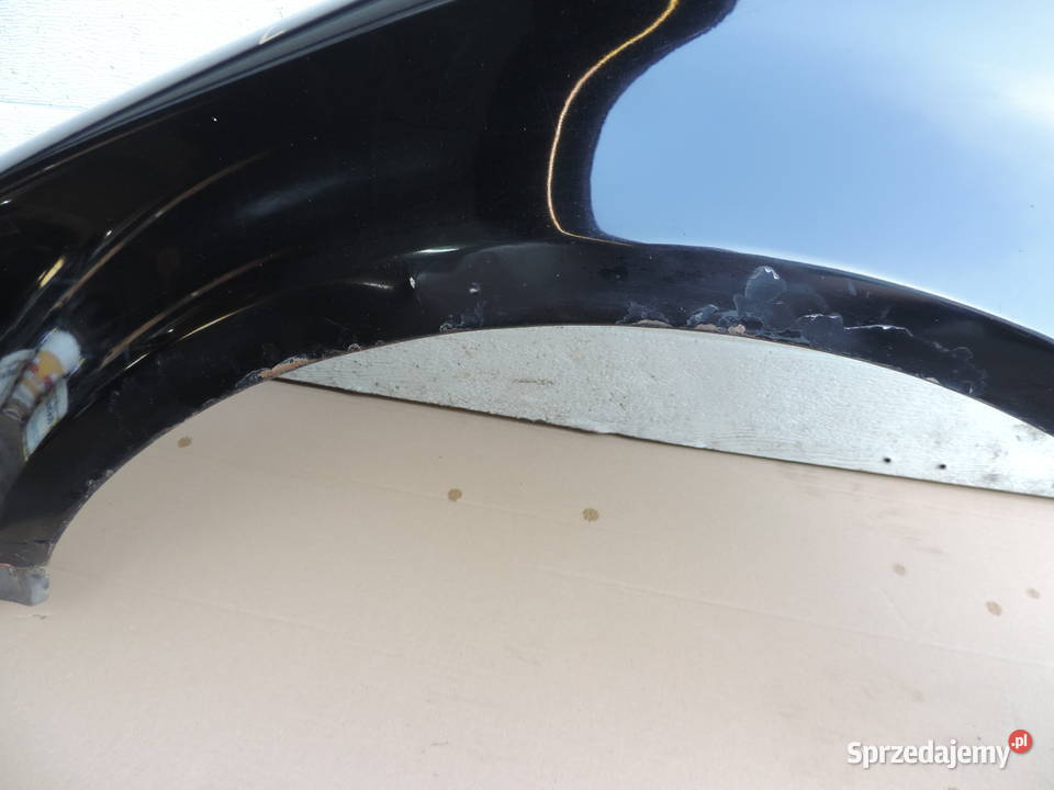 BŁOTNIK LEWY VW PASSAT B5 FL L041 osobowe