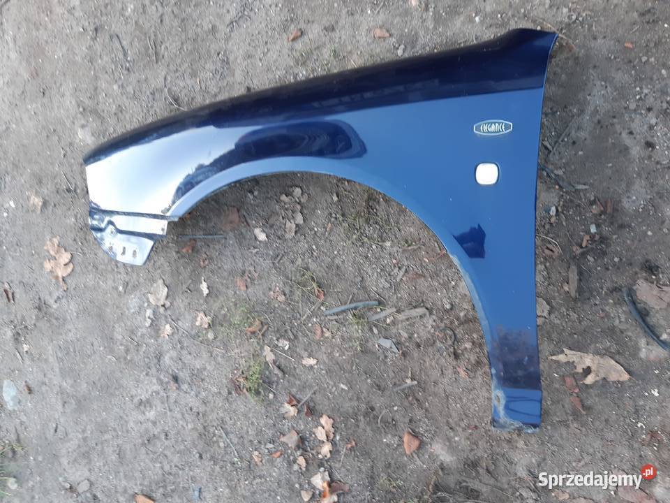 Octavia I Lift Blotnik lewy przod przedni 9460