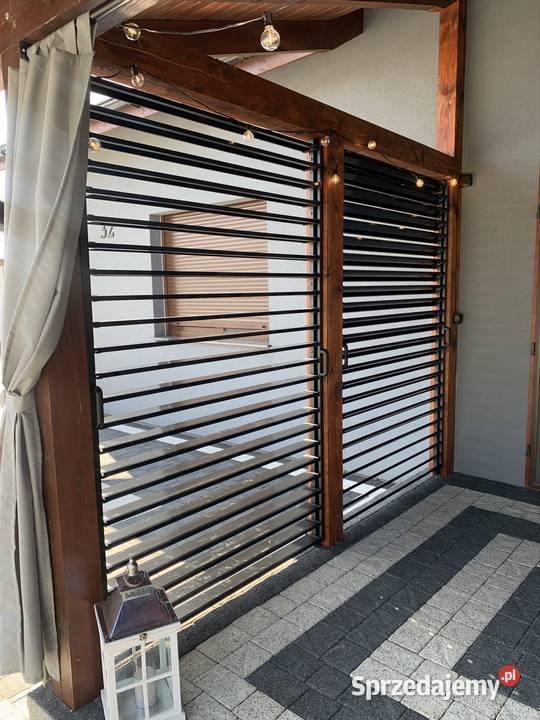 Zaluzje ogrodowe Shuttersy ruchome deseczki azur Wronki