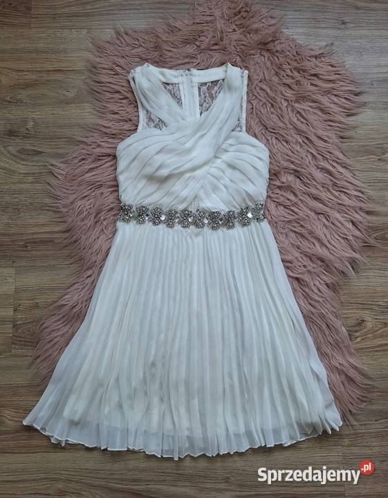 Piękna biała plisowana sukienka z kamieniami na Spódnice i sukienki Kraków sprzedam