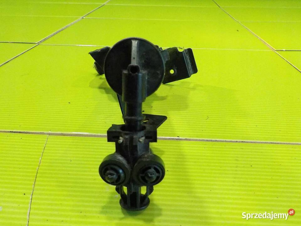 CHEVROLET CAPTIVA 10r spryskiwacz lampy lewy