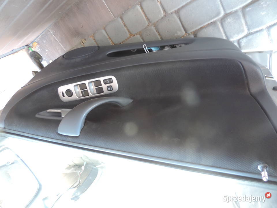 DRZWI LEWY PRZÓD PRZEDNIE SUZUKI LIANA HB Z2S Części Nowy Sącz