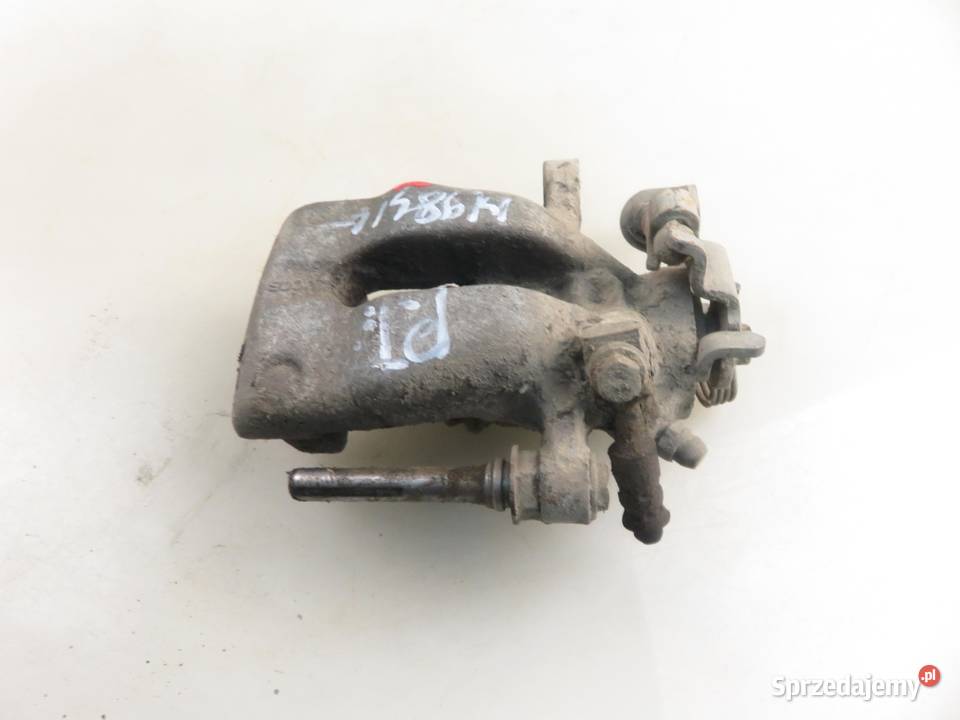 ZACISK PRAWY TYŁ OPEL COMBO C 13 CDTI 16V Z 13 osobowe