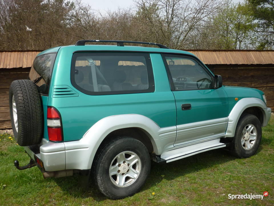 13 700 TOYOTA LAND CRUISER KZJ90 4x4 30 TD 125 D elektryczne lusterka Tokarnia