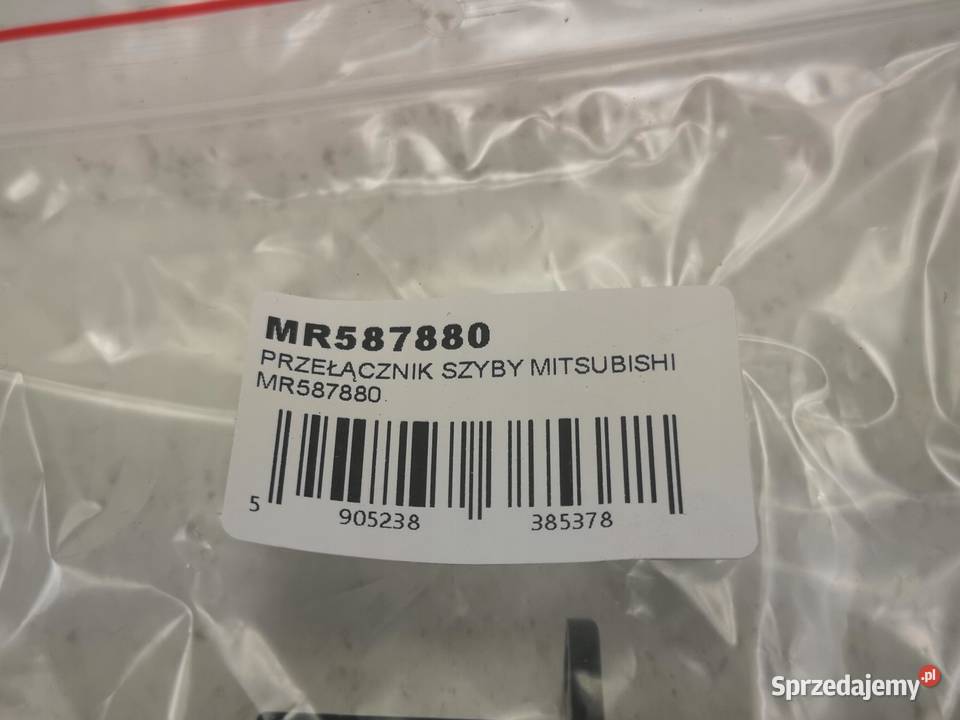 PRZEŁĄCZNIK SZYBY LEWY TYŁ MITSUBISHI LANCER VII osobowe