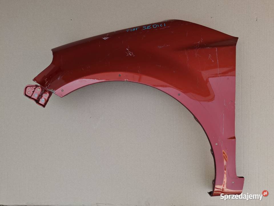 SUZUKI SX4 FIAT SEDICI BŁOTNIK LWY PRZÓD Błotniki Bieleń