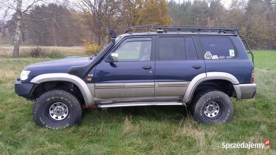 Nissan Patrol Y61 28 99 uszkodzony przyciemniane szyby Karnice