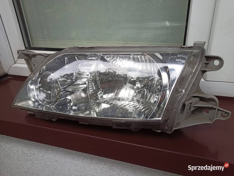 Mazda Premacy LIFT FL lampa przednia lewa osobowe Sieradz