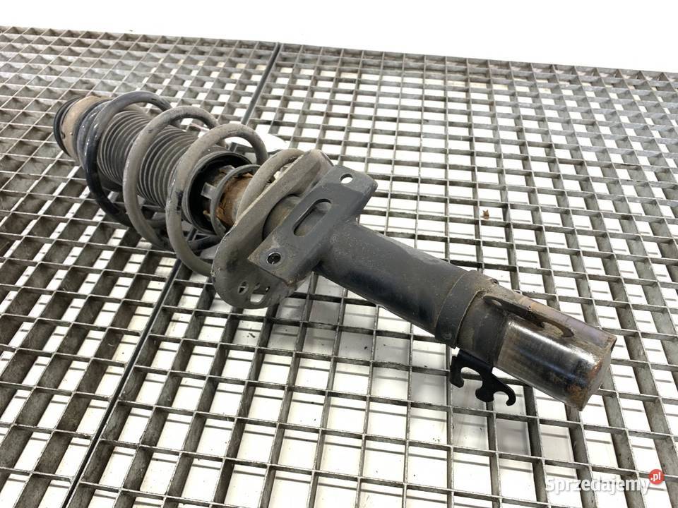 AMORTYZATOR PRAWY PRZÓD ZE SPRĘŻYNĄ VW POLO V 12