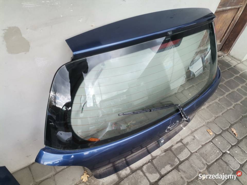 KLAPA BAGAŻNIKA TOYOTA YARIS I 8K8 HB Części samochodowe