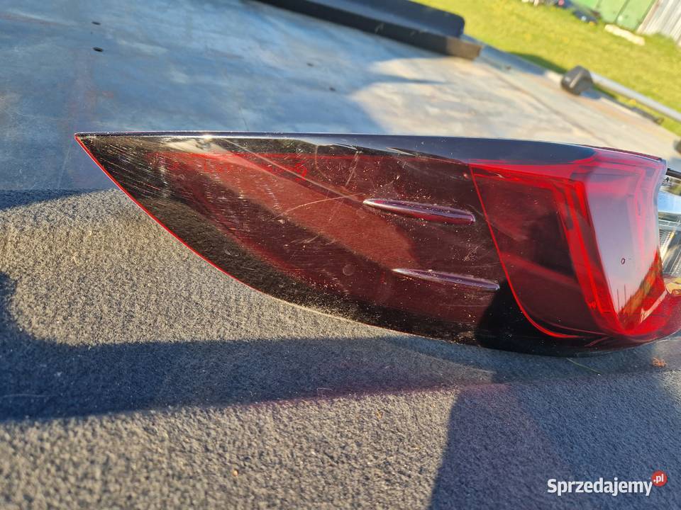 Toyota Corolla E210 E21 sedan lampa tył nowa ORG Mielec sprzedam