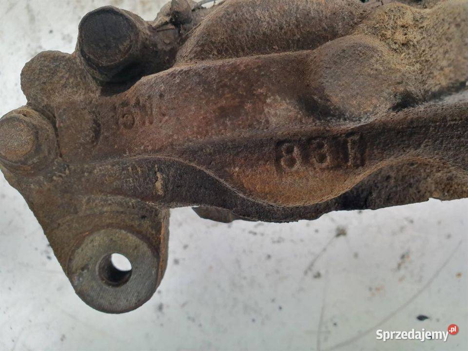 ZACISK HAMULCOWY PRZÓD LEWY TOYOTA LAND CRUISER Lipno