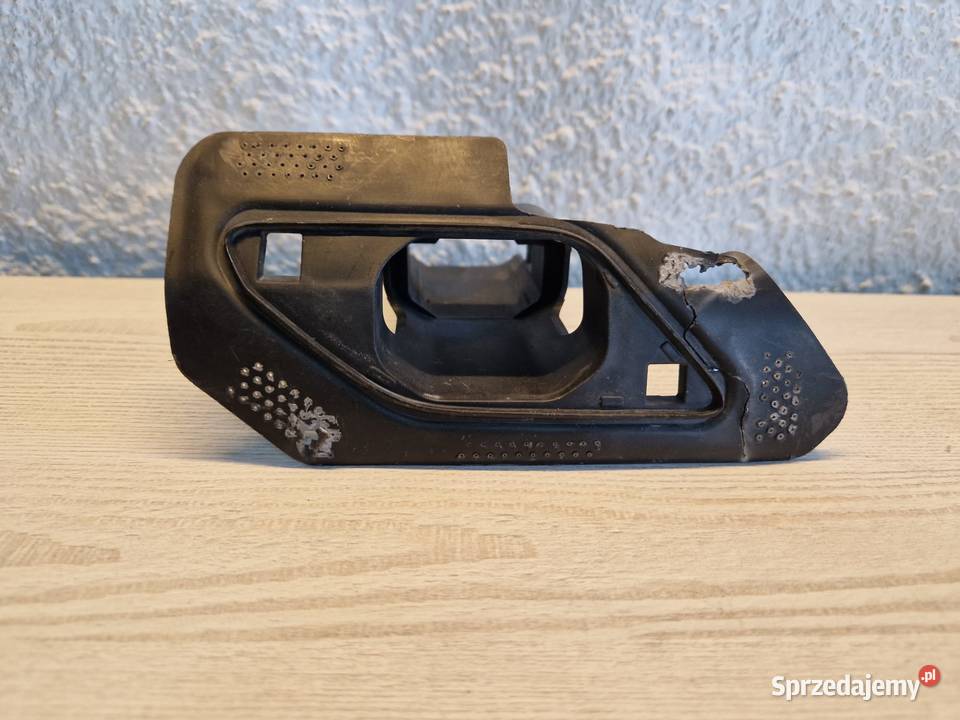 Mocowanie dyszy spryskiwacza reflektora WV Golf Kwilcz