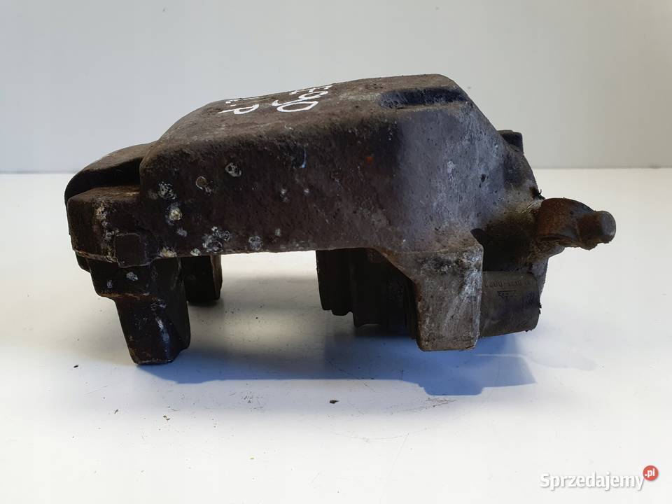 BMW E90 LEWY PRZEDNI ZACISK HAMULCOWY przód osobowe Rudka