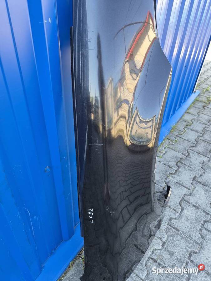 BŁOTNIK PRZÓD PRAWY VW PASSAT B5 FL LC9Z CZARNY Błotniki Działoszyce