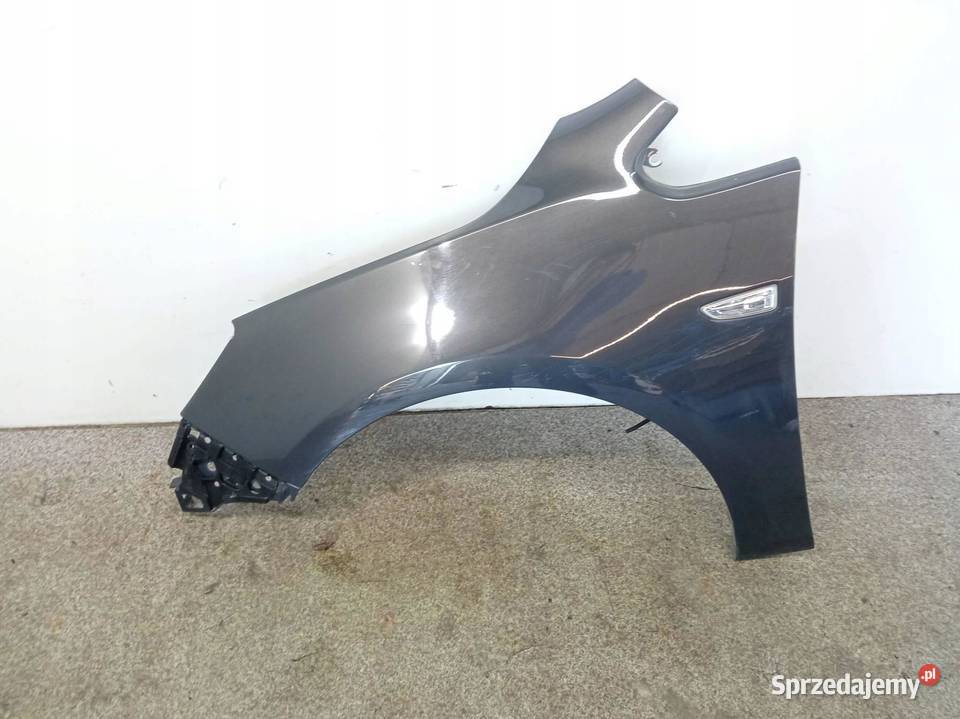 BŁOTNIK LEWY PRZÓD LIFT Z190 Opel Astra IV 2009 Błotniki