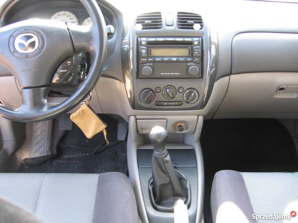 Mazda 323F niebieski metalic komputer pokładowy Smolec