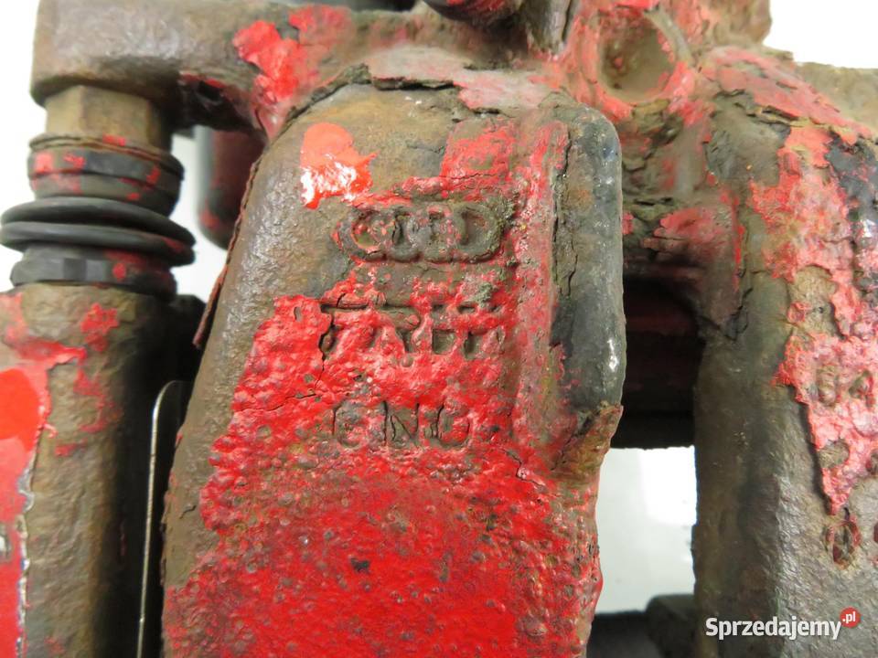 ZACISK PRAWY TYŁ AUDI A4 B8 20 TDI 32335478 Motoryzacja