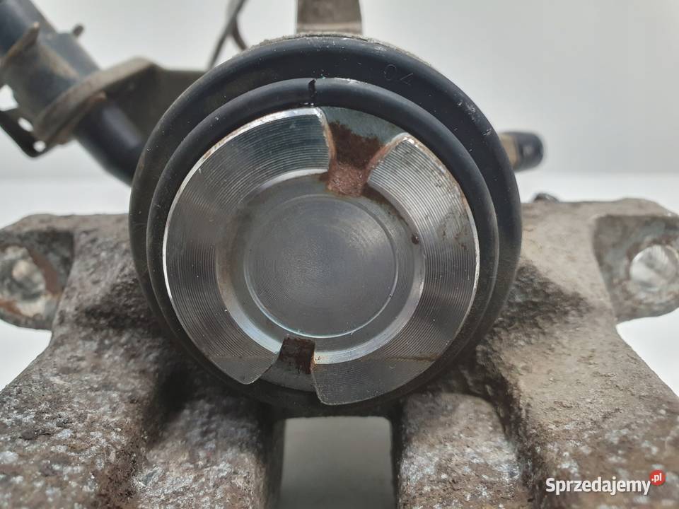 VW Golf IV Bora Audi A3 Toledo II LEWY ZACISK Chełm