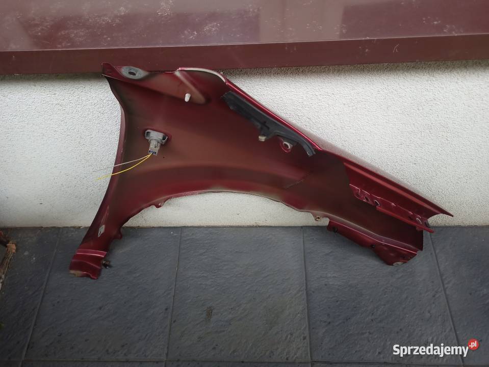 Toyota Corolla Verso 2 II błotnik przedni lewy Sieradz
