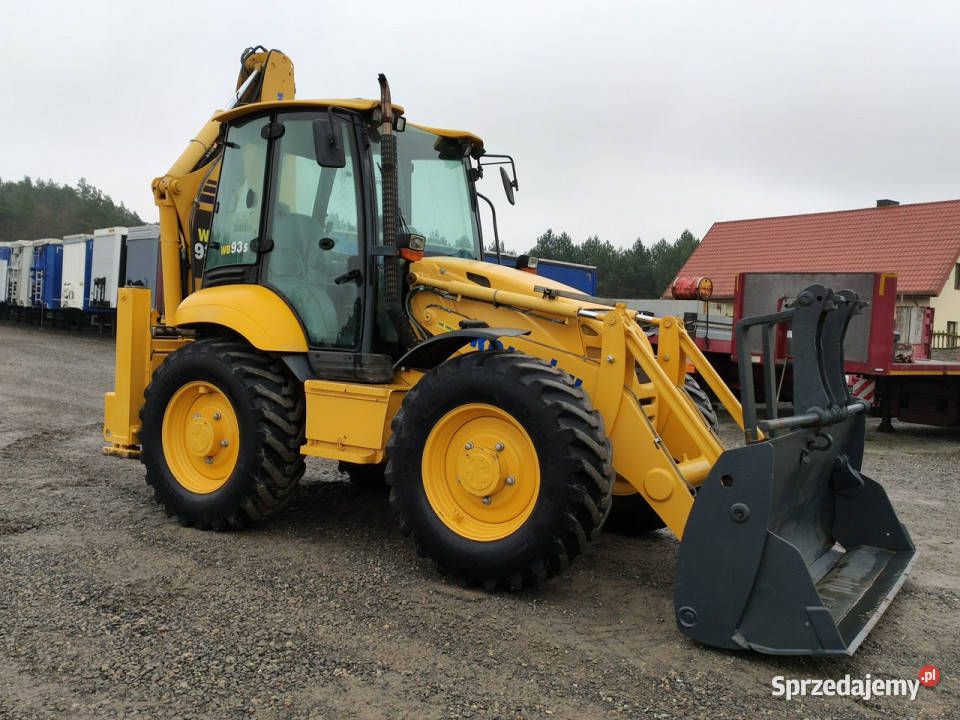 na równych kołach Komatsu WB 93S5E0 Bez Luzów