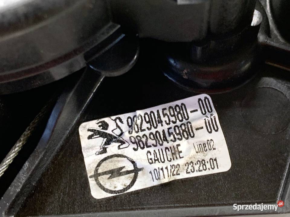 PODNOŚNIK SZYBY LEWY TYŁ OPEL CORSA F 9829045980