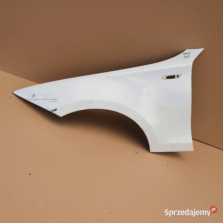 BMW 1 E87 BŁOTNIK LEWY PRZÓD Trzciel